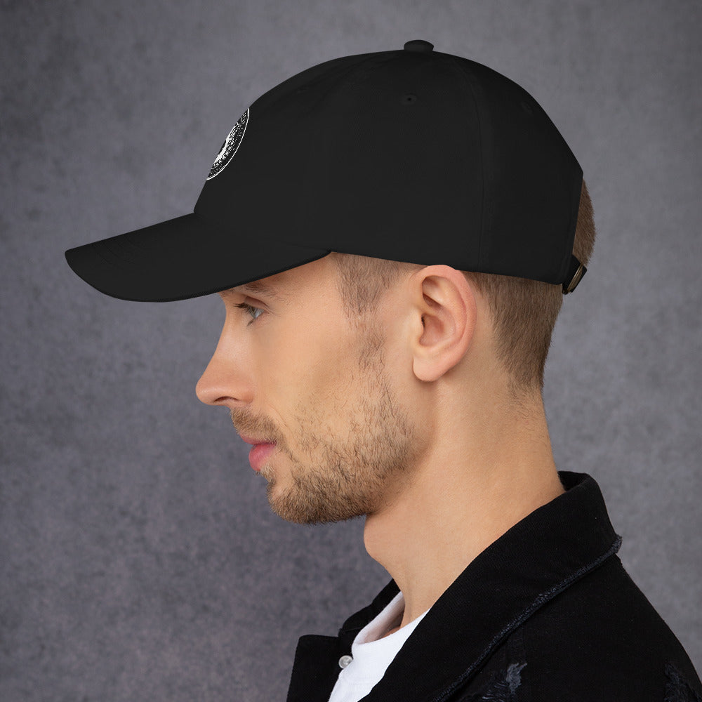 Dad hat in black worn by a man, featuring a low profile and adjustable strap, perfect for casual style.