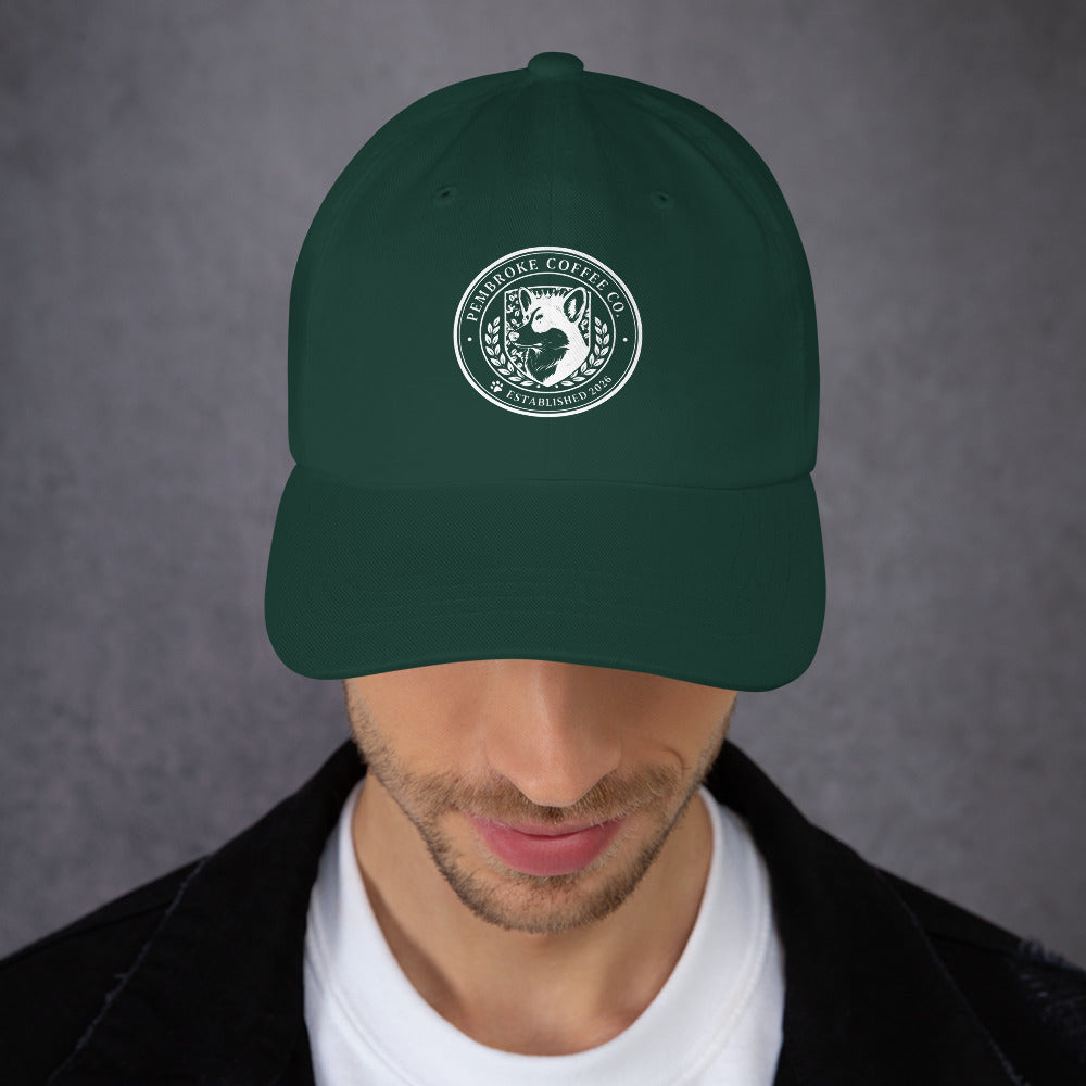 Dad hat in green color featuring a circular logo on the front, adjustable strap for a perfect fit.