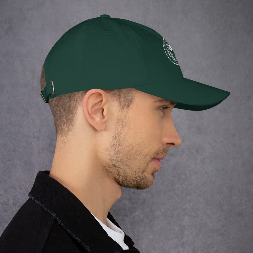 Dad hat in green camo color, featuring adjustable strap and curved visor, showcased on a male model. 
