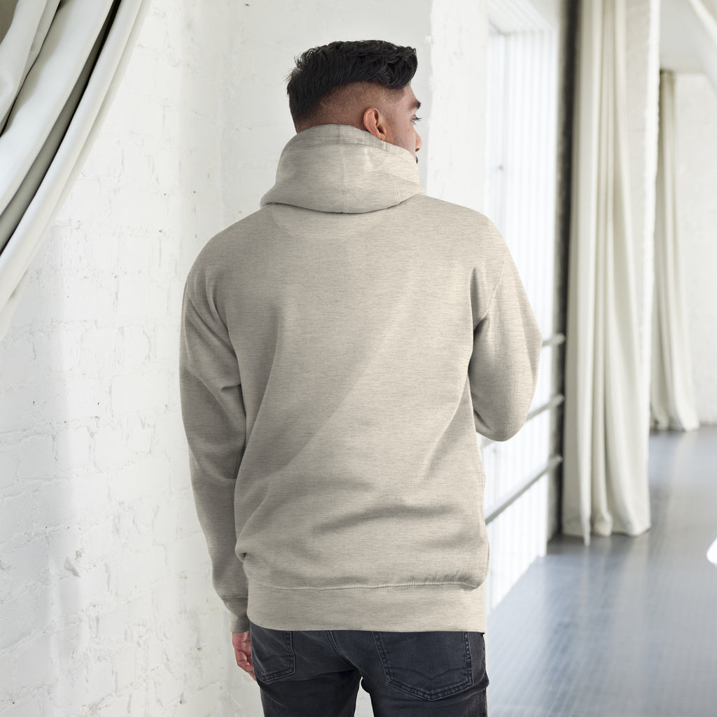 Unisex Hoodie worn from the back, showcasing its soft fabric and relaxed fit for a stylish streetwear look.