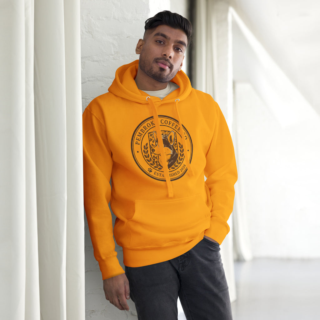 Unisex Hoodie in vibrant orange worn by a model, featuring a unique logo design and spacious pouch pocket.