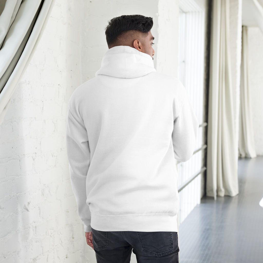 Man wearing a white unisex hoodie, showcasing the back design in a modern indoor setting.