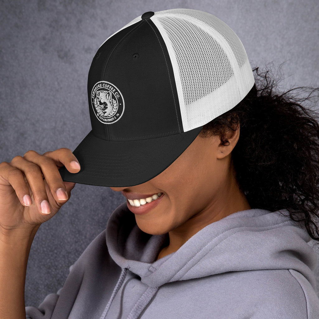 Trucker Cap featuring a structured six-panel design and mesh back, perfect for sunny days.
