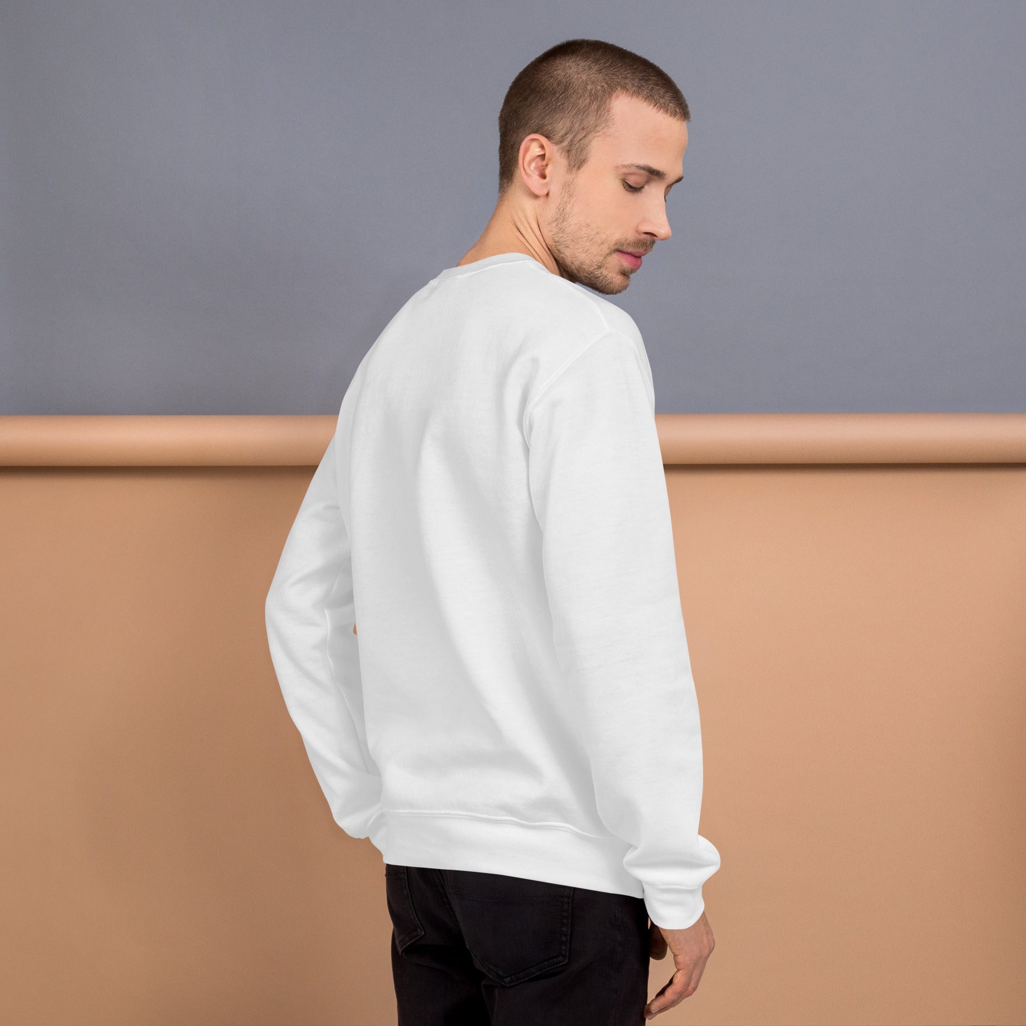 Unisex Sweatshirt worn by a model, showcasing the back view against a neutral background.