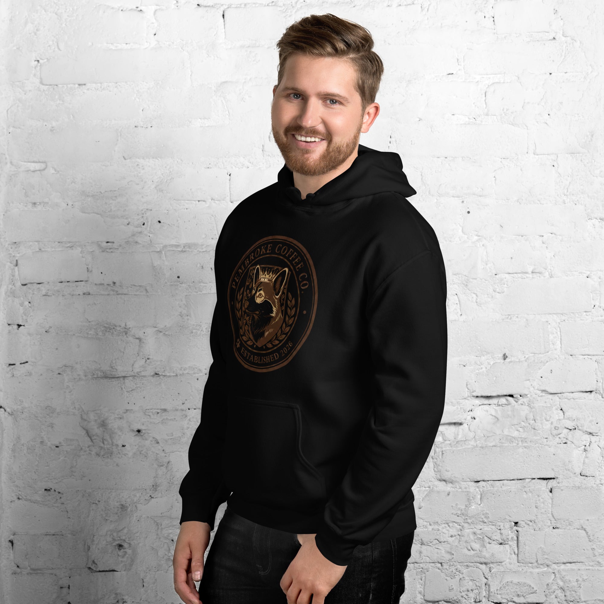 Model wearing a Unisex Hoodie featuring a unique logo design, perfect for stylish comfort.