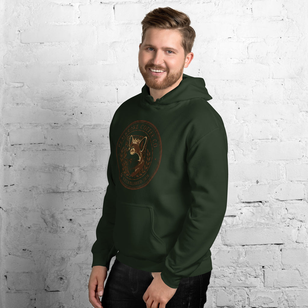 Unisex Hoodie worn by a smiling man, featuring a graphic design on a dark green background.