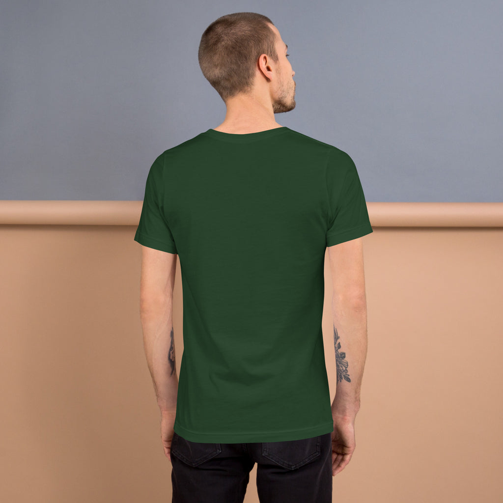 Back view of a man wearing a green Unisex t-shirt, showcasing its comfortable fit and stylish design.