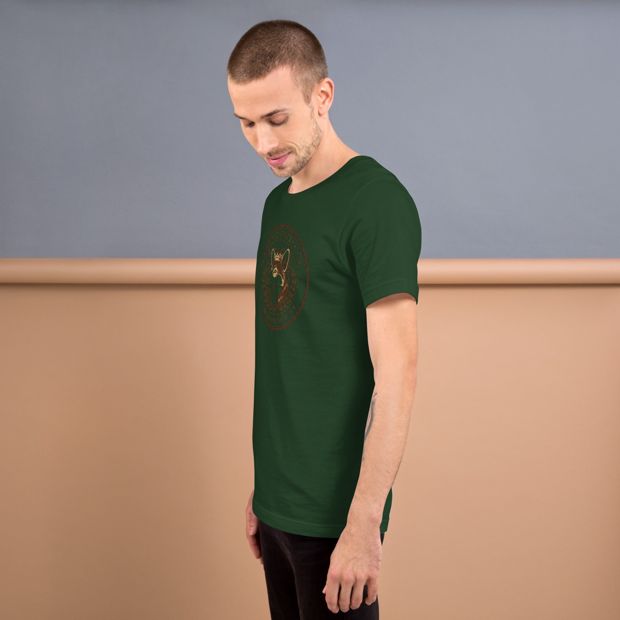 Unisex t-shirt in dark green worn by a man, showcasing a stylish design for comfortable and flattering fit.