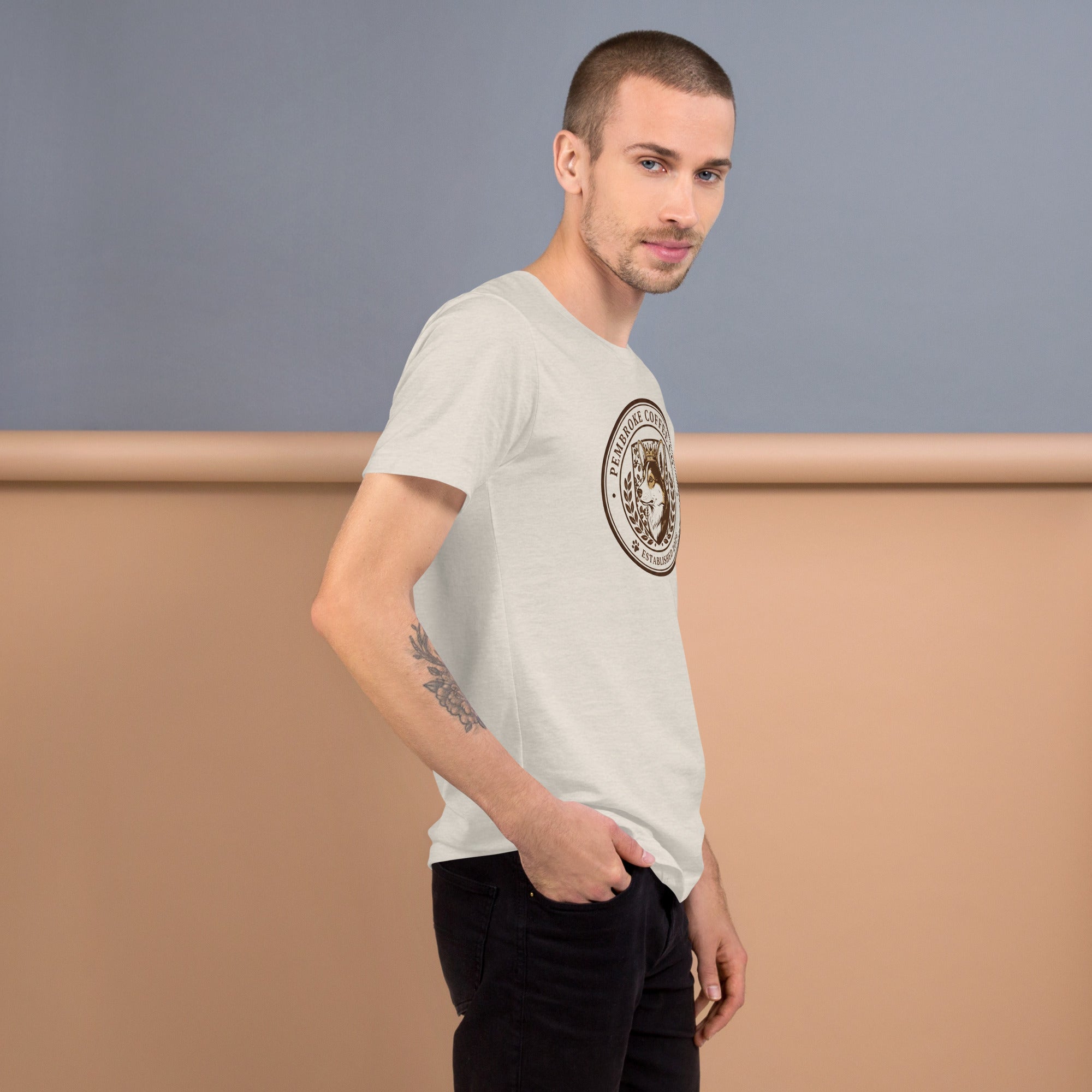Unisex t-shirt displayed on a male model, showcasing its soft fabric and stylish design.