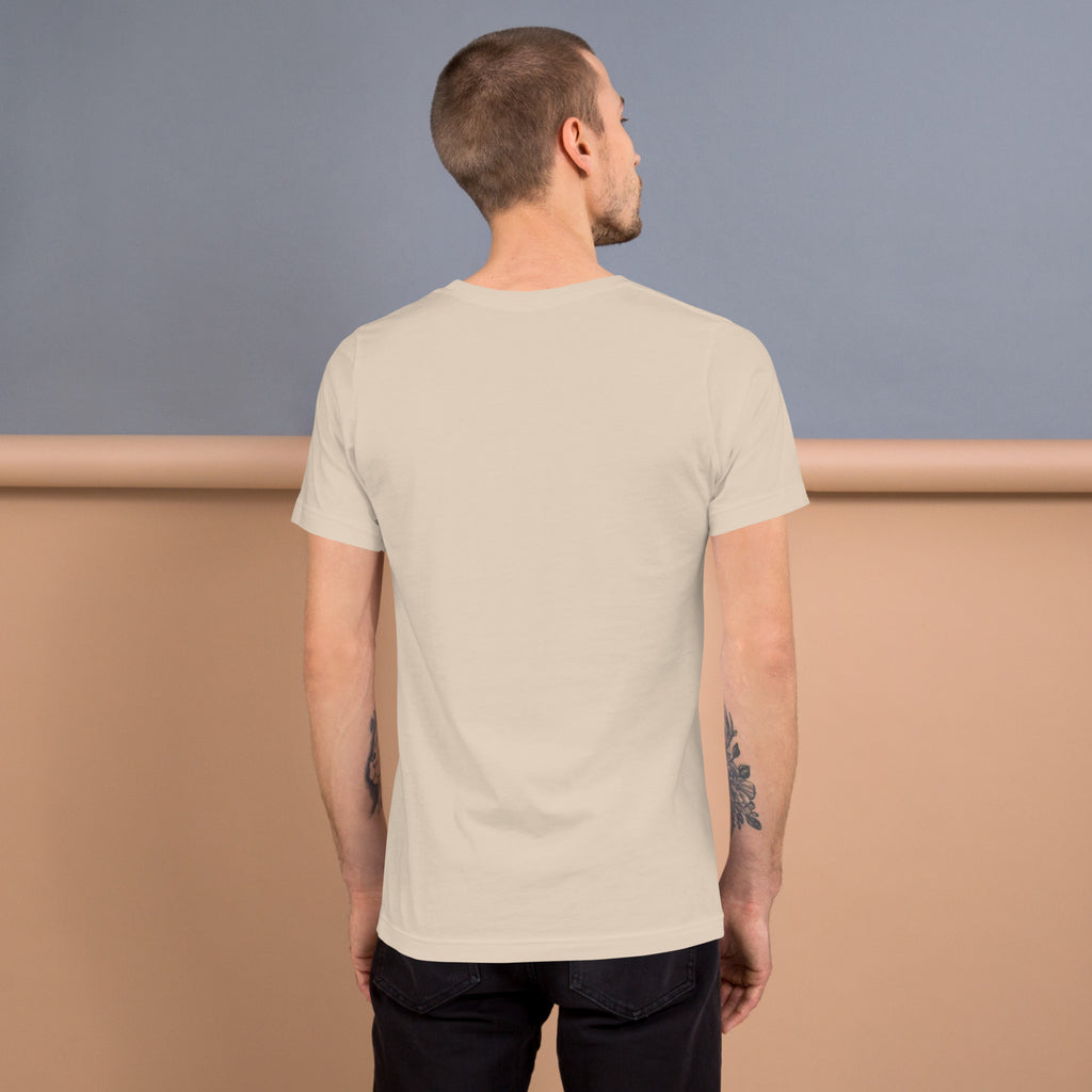 Back view of a man wearing a soft, lightweight unisex t-shirt in a neutral color.
