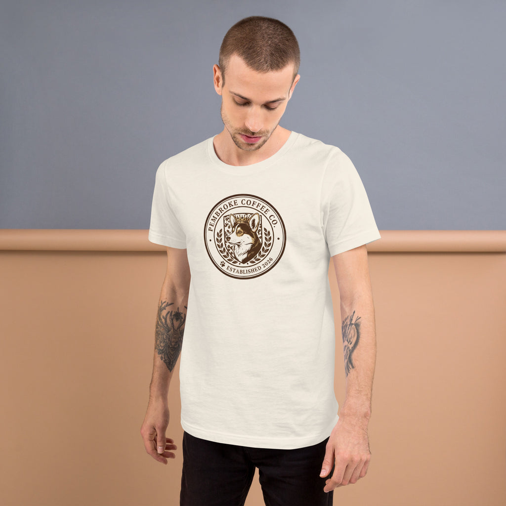 Unisex t-shirt displayed on a model, featuring a distinctive coffee logo design, perfect for casual wear.